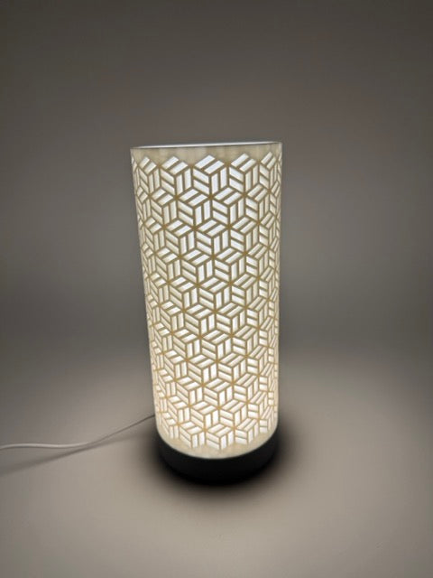 'Dia' table lamp with geometrically cut cylinder shade and sleek base – Modern mood lighting